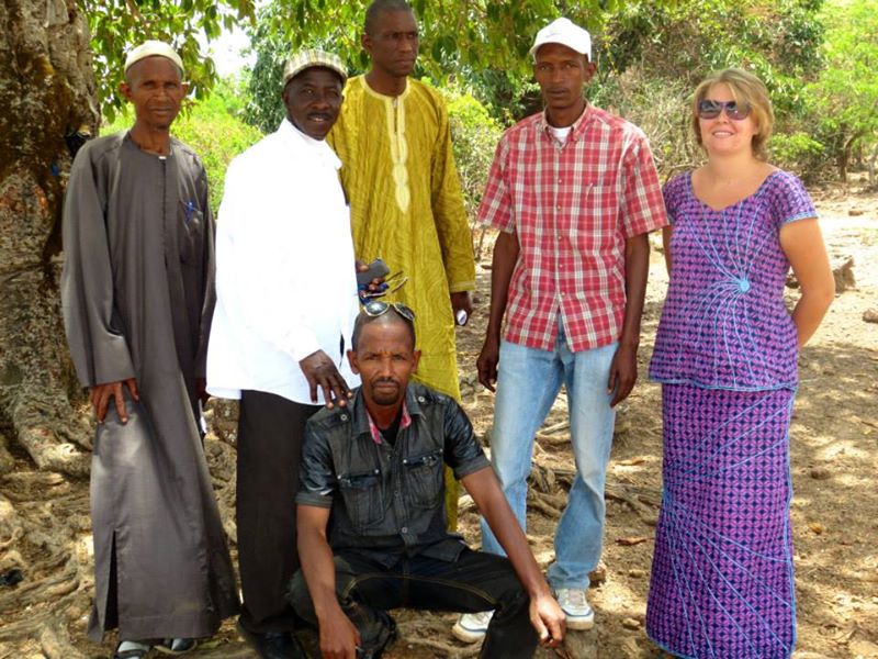Rebecca Refoy with community leaders in Korbé, Guinea, during her Peace Corps service